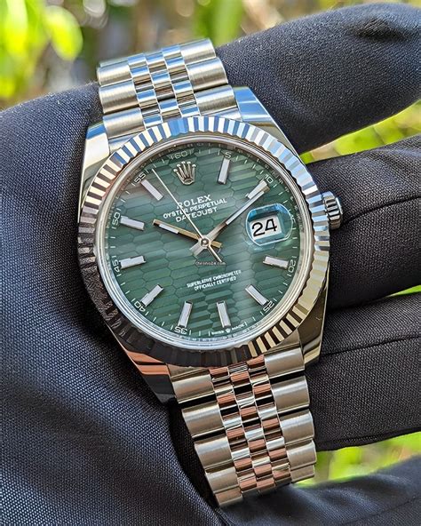 rolex green dial silver|Rolex with a green face.